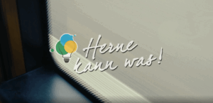 Screenshot aus dem HCR-Video mit dem Logo von „Herne kann was!“ und einer Straße im Hintergrund